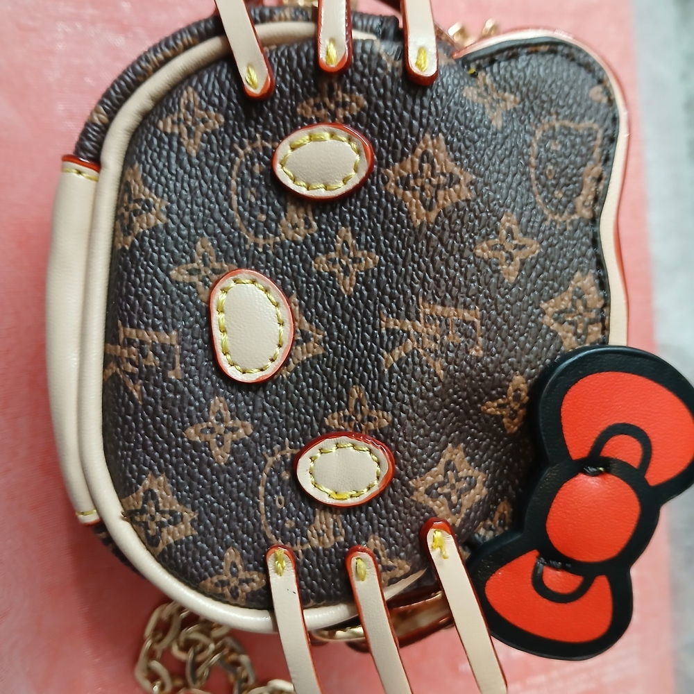 Brown Designer Crossbody Bag with Red Accents